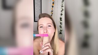 Blond sucks large sextoy on camera