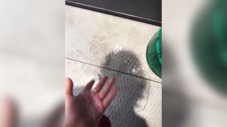 Squirting a lot and fingering pink twat in public