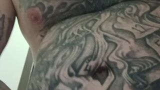 Tattooed up white stud jacking off.