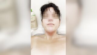 Gal masturbates in bathtub with her fingers and brings herself to climax