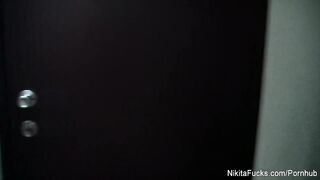 Nikita Von James plays with her large breasts