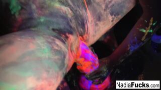 Ebony-light honeys Nadia and Ophelia suck off a colorful dong