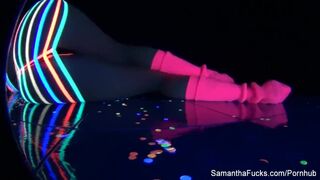 Colorful blacklight teasing with Samantha Saint