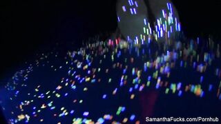 Colorful blacklight teasing with Samantha Saint