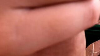 Sucking a large rod on balcony