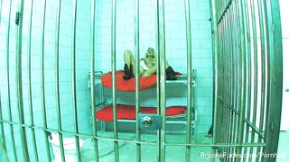 Prisoner Brooke plays with her taut vagina