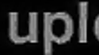 A pretty woman with greenish-blue double ponytails was being severely exercised on the daybed