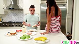 Annoying lalin girl step sister sucks on a banana right in front of step bro