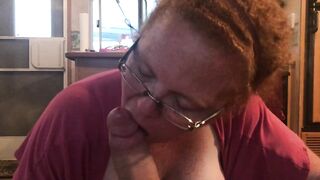 Ginger with large breasts sucks on large shlong