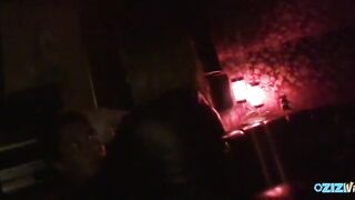 That babe was disrobing in the booth and enticing a guy by caressing him.