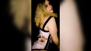 Sexy blond dancing in bathing costume