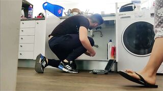 Concupiscent wife bangs handyman underneath the sink.