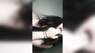 The woman show off her glamorous body and big bazookas.