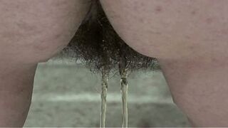 Large pissing doggy style. A big beautiful woman with a large butt and a unshaved snatch voids urine.