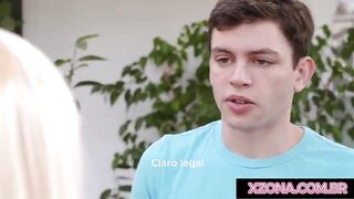 Stepmother and stepson doing yoga jointly.