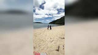 Three-some on the beach - that guy pulled her bikini to the side and inserted his very pleasurable wang into her.