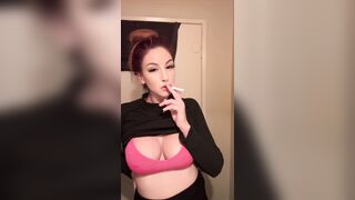 Artemisia Love smokin' a cigarette and showing her flawless bazookas