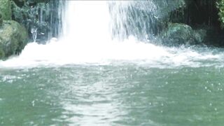 Laura Gemser and Monica Zanchi at the waterfall
