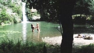 Laura Gemser and Monica Zanchi at the waterfall