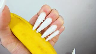 Lengthy White Nails Scratching And Destroying Banana Like Penis