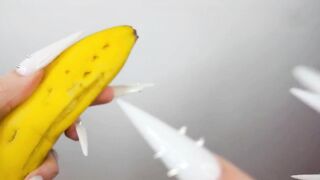 Lengthy White Nails Scratching And Destroying Banana Like Penis