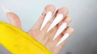 Lengthy White Nails Scratching And Destroying Banana Like Penis
