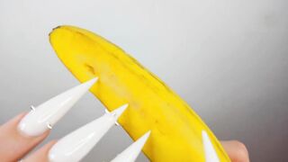 Lengthy White Nails Scratching And Destroying Banana Like Penis