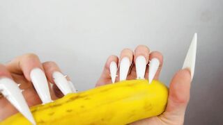 Lengthy White Nails Scratching And Destroying Banana Like Penis