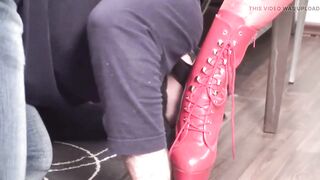 Redhead mistresse using her 2 slaves