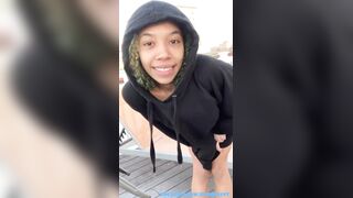Slender Black Emo Gal masturbates her creamy cunt on the rooftop and eats her own cum