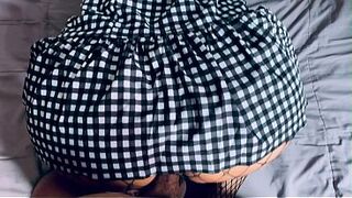 Not Even a Lengthy Suit Can Hide That Large Booty