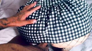 Not Even a Lengthy Suit Can Hide That Large Booty