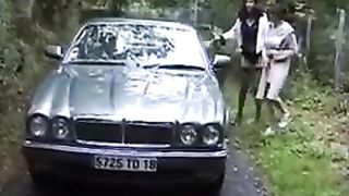 Mature women plays with girl in car