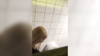 Lesbians get hot in toilet cubicle