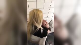 Lesbians get hot in toilet cubicle
