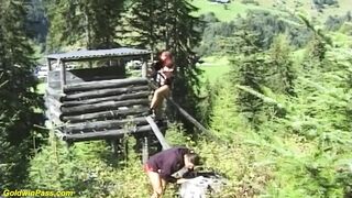 German pair bangs in front of the mountains