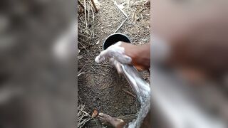 A male masturbating inside his bath with soap