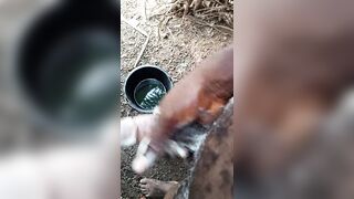 A male masturbating inside his bath with soap
