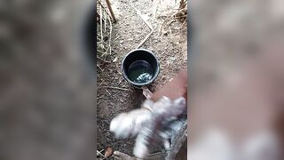 A male masturbating inside his bath with soap