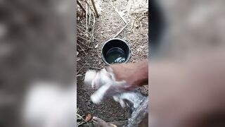 A male masturbating inside his bath with soap