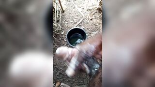 A male masturbating inside his bath with soap