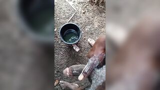 A male masturbating inside his bath with soap