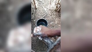 A male masturbating inside his bath with soap