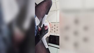 Hot trans cutie strokes her large schlong during the time that peeing and cumming on herself.