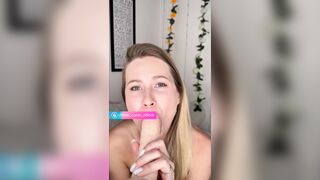 Golden-haired sucks large vibrator on camera