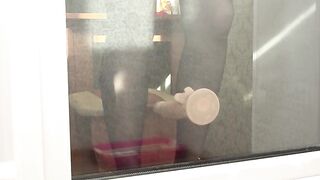 I watch throughout the window, as my neighbour with a hot ass masturbates with a rubber weenie. Is that babe doing this by the window on purpose? Amateur.