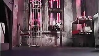 Busty slave must kneel to suck mistress' strap-on then gets paddled hard on ass