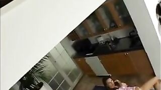 Two beautiful brunette lesbians play in the dining room