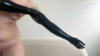 Hawt Domina Redhead Teases in Latex Opera Gloves and Haunch High Boots