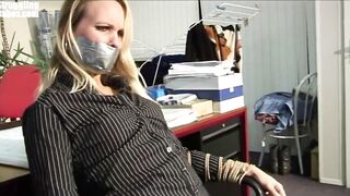 Secretary Bound to Chair Tapegagged